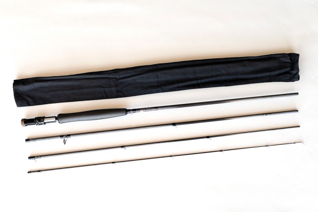 9ft #5wt custom fly rod from the 2026 Soul & Spiral Collection featuring a hand-sculpted graphite grip and spiral guide system, handmade in Valencia, Spain.