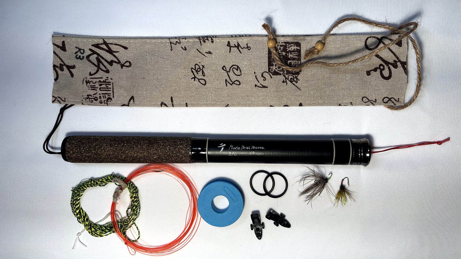 Handmade Tenkara R3 rod, numbered 3 of 24, folds to 28cm closed, with unique hand-stitched calligraphy-print fabric case and gift set