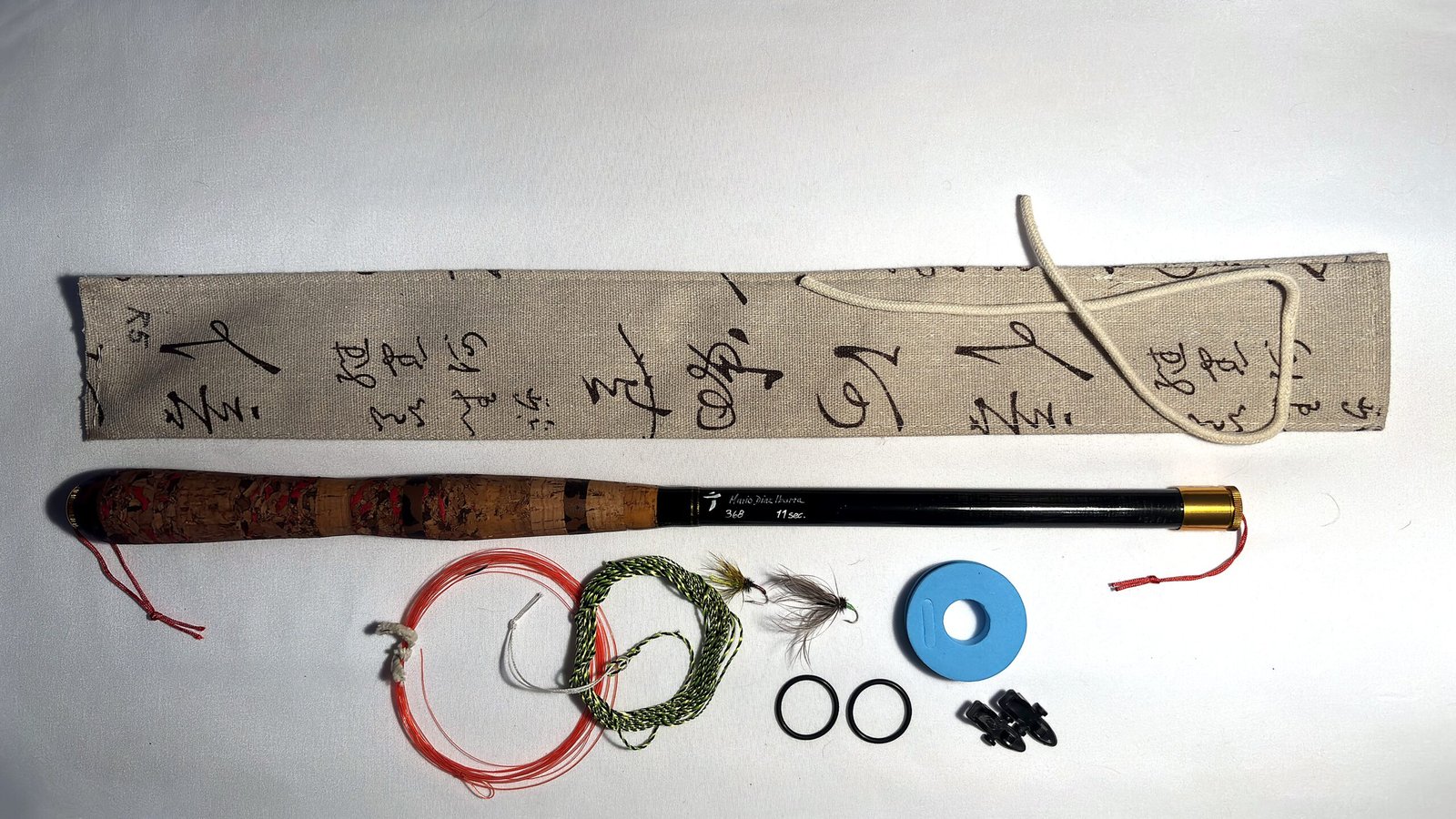 Handmade Tenkara R5 rod, numbered 5 of 24, folds to 44cm closed, with unique hand-stitched calligraphy-print fabric case and gift set